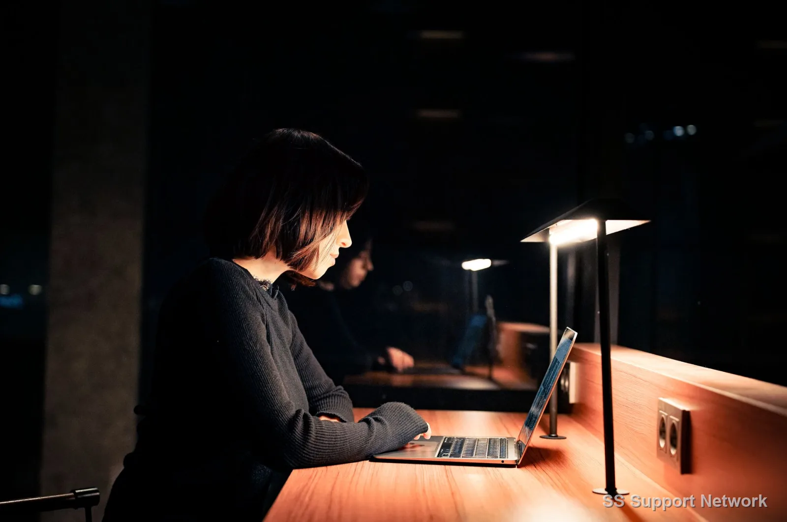 An overnight operations desk staffed through the night